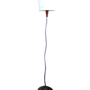 Minimalist slim floor lamp with white shade for apartment rental.